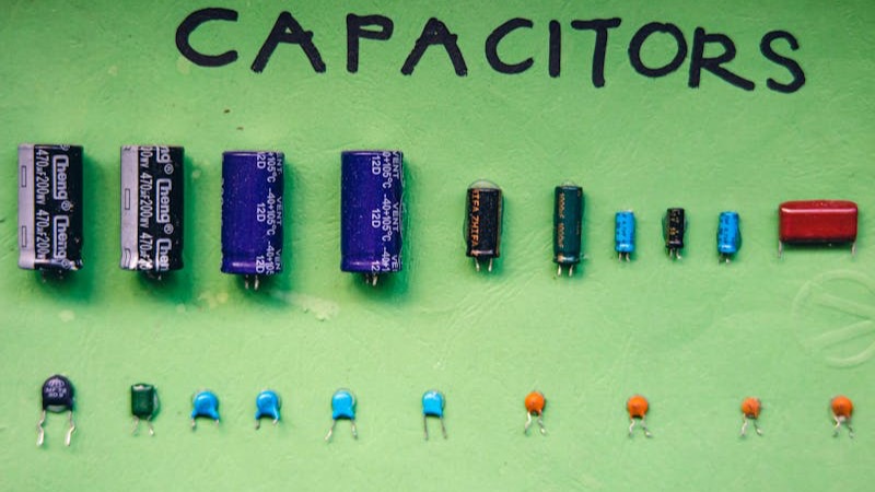 AC capacitor replacement service being performed on outdoor unit in Qatar